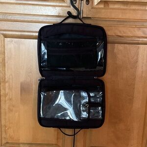 Clamshell opening toiletry bag